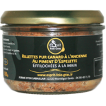 Rillettes pur canard à foie gras du Sud Ouest IGP au piment d'Espelette. Effilochées à la main, texture octueuse, goût délicat de canard légèrement relevé.